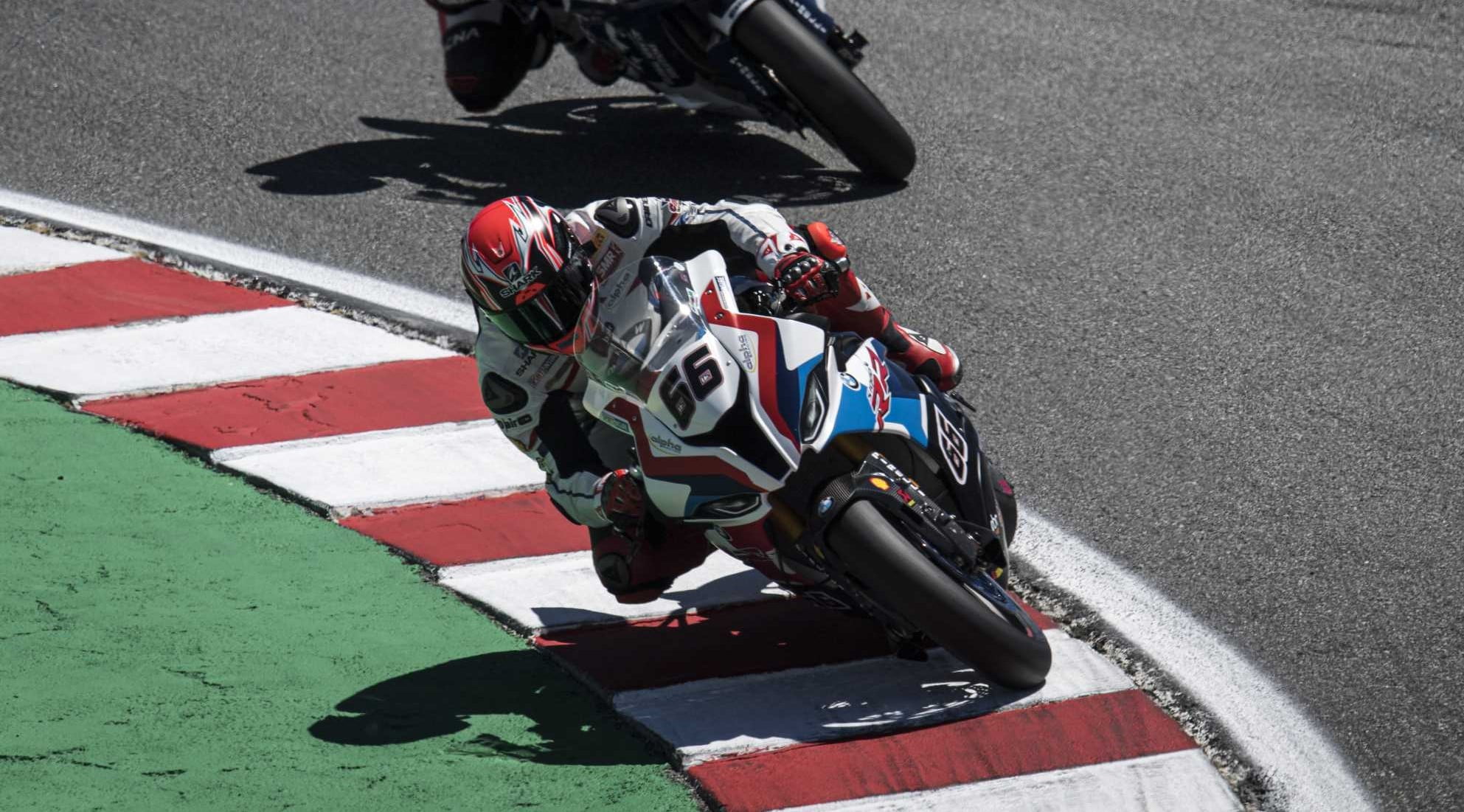 scott redding wins the superpole at aragon as chaz davies follows