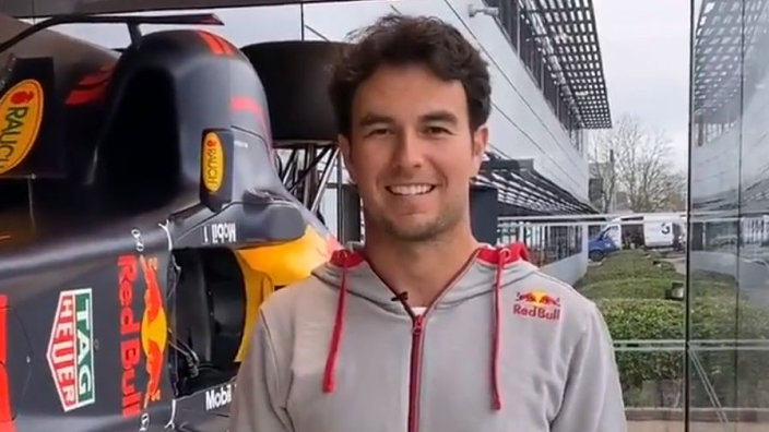 Sergio Perez enjoys his first day at Red Bull