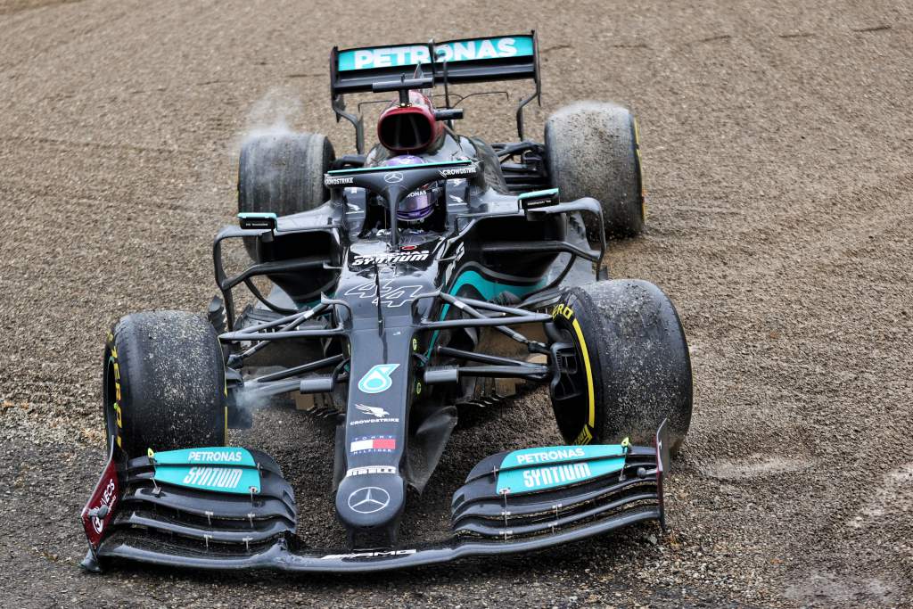 Why Hamilton did not get a penalty for reversing onto the track