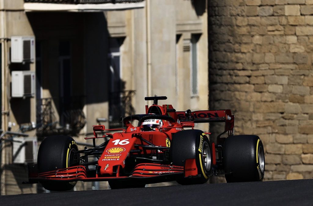 leclerc lost race lead to p4 because there was a tree branch on the track