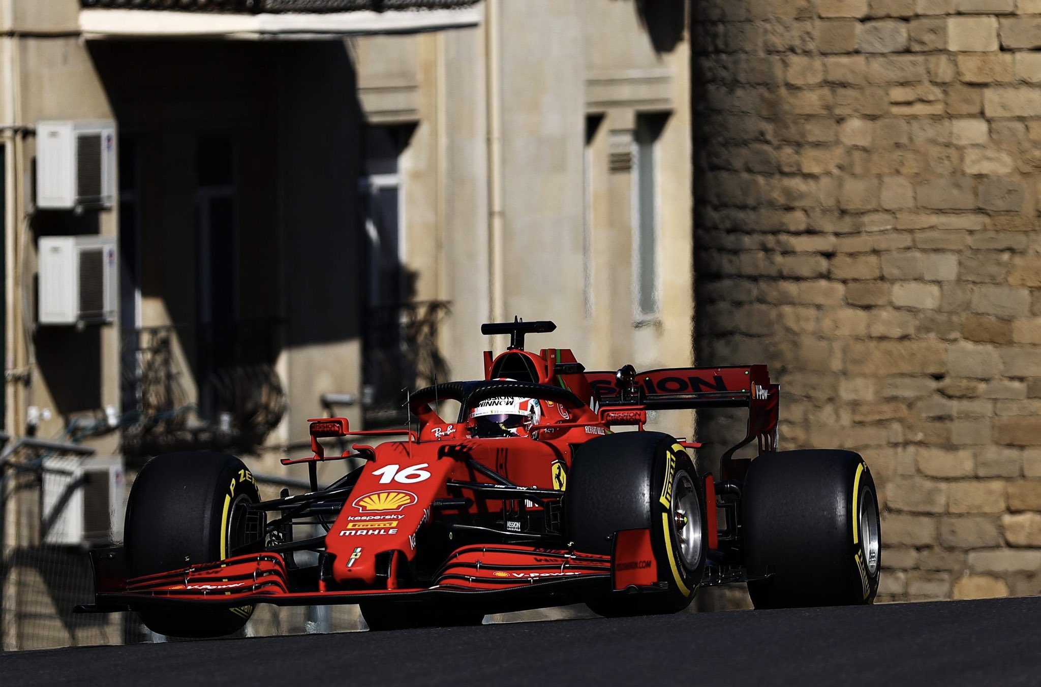 leclerc lost race lead to p4 because there was a tree branch on the track