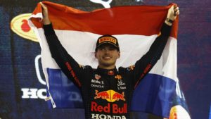 Max Verstappen wins maiden championship title after a dramatic last lap overtake on Hamilton