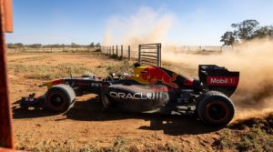 All smiles as Daniel Ricciardo drives an F1 car on the Australian outback