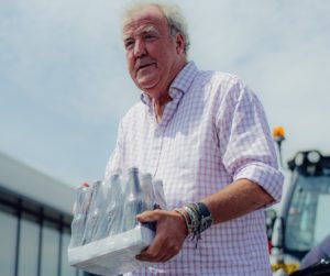 Jeremy Clarkson honours his bet to buy F1 team beers after podium finish